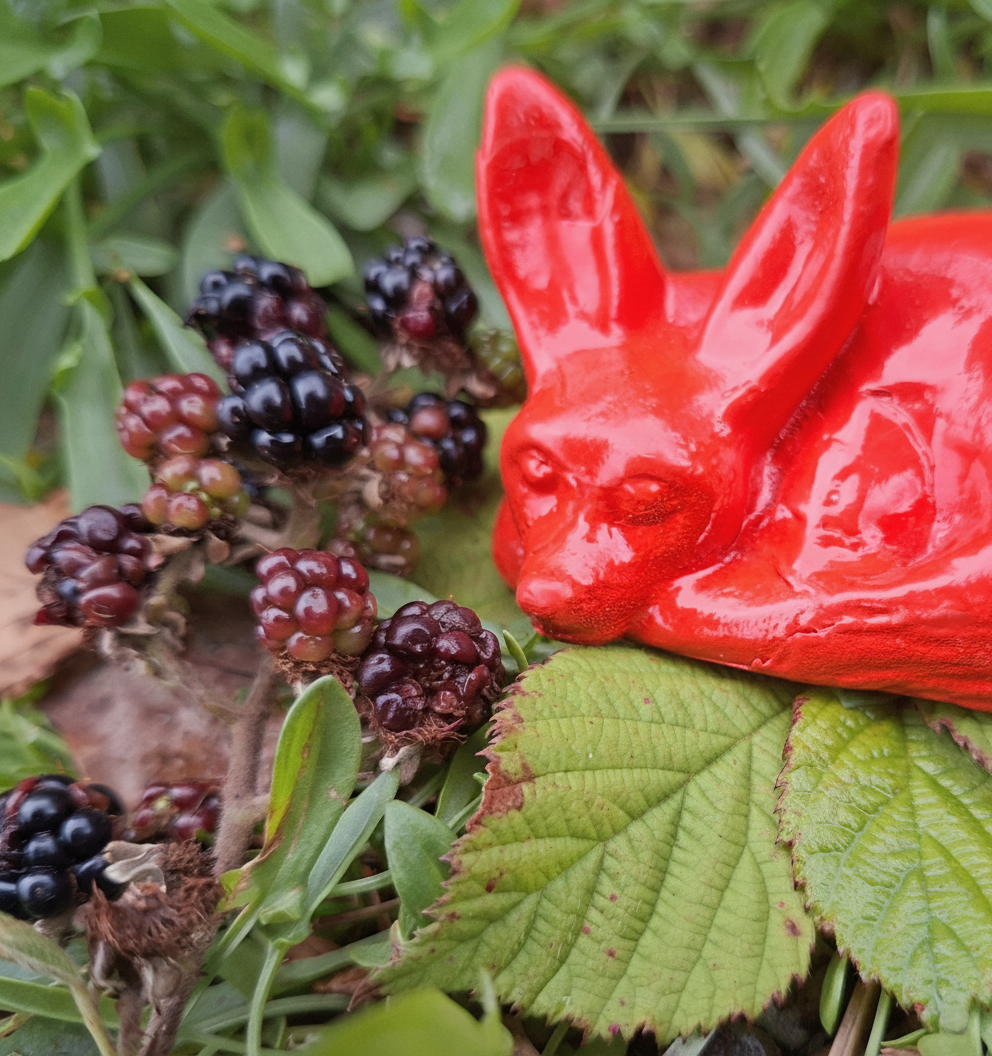 Mini Fox sculpture with berries Loch Lomond Scotland
